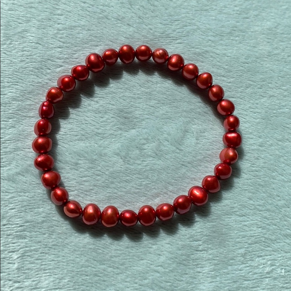 Red “pearl” stretchy bracelet
